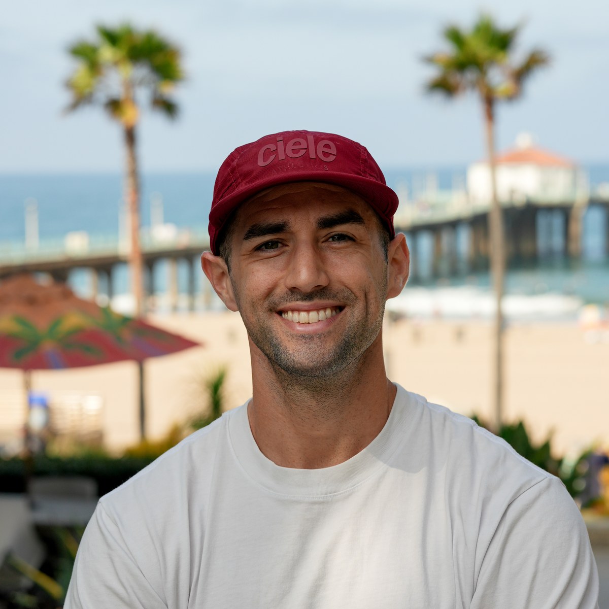 Tony, who wrote HYROX PREP, in his red cap at the Manhattan Beach pier